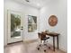 Home office with a desk and chair, plus an exterior door at 1695 North Nw Ave, Atlanta, GA 30318