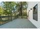 Private deck with wooded views and modern railing at 1695 North Nw Ave, Atlanta, GA 30318