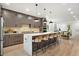 Modern kitchen with large island, white countertops, and wood cabinetry at 1695 North Nw Ave, Atlanta, GA 30318