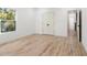 Spacious bedroom with hardwood floors and access to hallway at 1695 North Nw Ave, Atlanta, GA 30318