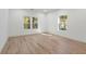 Bright bedroom with hardwood floors and two windows at 1695 North Nw Ave, Atlanta, GA 30318