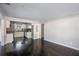 Bright living room with dark hardwood floors and an open concept kitchen at 3060 Washington Rd, Atlanta, GA 30344
