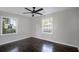 Spacious bedroom with dark hardwood floors and plenty of natural light at 3060 Washington Rd, Atlanta, GA 30344