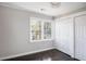 Charming bedroom with hardwood floors, large windows, and double closets at 3060 Washington Rd, Atlanta, GA 30344