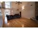 Spacious Gathering room with hardwood floors, high ceilings and views to entry at 3598 Brock Rd, Duluth, GA 30096