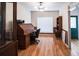 Spacious home office with hardwood floors, built-in shelving, and natural light at 3598 Brock Rd, Duluth, GA 30096