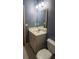 Simple bathroom with white vanity and blue walls at 3598 Brock Rd, Duluth, GA 30096