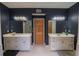 Double vanity bathroom with two sinks and plenty of cabinet space at 3598 Brock Rd, Duluth, GA 30096