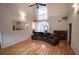 Gathering room with hardwood floors, high ceilings and open concept at 3598 Brock Rd, Duluth, GA 30096