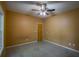 Spacious bedroom with neutral walls, ceiling fan, and carpet at 3598 Brock Rd, Duluth, GA 30096