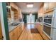 Bright kitchen with wood cabinets, ample counter space, and access to a deck at 3598 Brock Rd, Duluth, GA 30096