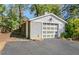 Detached garage with a paved driveway at 1039 Ridgecrest Dr, Smyrna, GA 30080