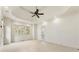 Large bedroom with carpeted floors and ceiling fan at 6202 Talmadge Nw Way, Acworth, GA 30101