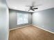 Bright bedroom featuring neutral walls and carpet at 1615 Cheshire Ct, Lawrenceville, GA 30043