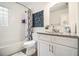 Clean bathroom with tub, shower, and updated vanity at 1260 Eastland Se Rd, Atlanta, GA 30316