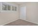 Bright bedroom with neutral walls, carpet flooring, and ample window light at 1883 Cindy Dr, Decatur, GA 30032