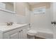Clean bathroom with white tile, vanity, and tub/shower combo at 1883 Cindy Dr, Decatur, GA 30032
