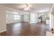 Open concept living area with hardwood floors and kitchen views at 6275 S Skyline Dr, Douglasville, GA 30135