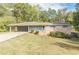 Ranch style home with brick and light blue accents, situated on a grassy lot at 6275 S Skyline Dr, Douglasville, GA 30135
