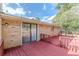 Brick home with sliding glass door leading to a deck at 6275 S Skyline Dr, Douglasville, GA 30135