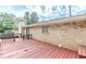 Red wooden deck and brick home exterior at 6275 S Skyline Dr, Douglasville, GA 30135