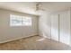 Spacious bedroom with neutral walls, carpet, and ceiling fan at 6275 S Skyline Dr, Douglasville, GA 30135