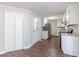 Kitchen with white cabinets, granite counters, and stainless steel appliances at 6275 S Skyline Dr, Douglasville, GA 30135