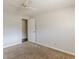 Cozy bedroom with neutral walls, carpet, and ceiling fan at 6275 S Skyline Dr, Douglasville, GA 30135