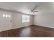 Spacious living area with wood-look floors and neutral wall colors at 6275 S Skyline Dr, Douglasville, GA 30135