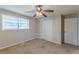 Bedroom with ceiling fan, closet, and window at 6275 S Skyline Dr, Douglasville, GA 30135