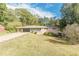 Ranch style home with carport and mature landscaping at 6275 S Skyline Dr, Douglasville, GA 30135
