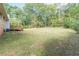 Large grassy backyard with mature trees and privacy at 6275 S Skyline Dr, Douglasville, GA 30135