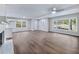 Bright living room with large windows and hardwood floors at 3599 Dial Dr, Stone Mountain, GA 30083