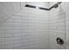 Clean shower with white subway tile and brushed nickel fixtures at 1048 Garibaldi Sw St, Atlanta, GA 30310