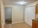 Simple dining area with tile floor and access to kitchen at 310 Wolf Downs Way, Atlanta, GA 30349