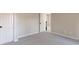 Bright bedroom with plush carpeting and neutral wall tones at 4348 Meadow Vista Dr, Stonecrest, GA 30038