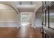 Bright and spacious entryway with hardwood floors and views into the living area at 4348 Meadow Vista Dr, Stonecrest, GA 30038