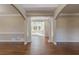 Spacious dining room with hardwood floors and elegant chandelier at 4348 Meadow Vista Dr, Stonecrest, GA 30038