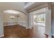 Spacious dining room with hardwood floors and elegant chandelier at 4348 Meadow Vista Dr, Stonecrest, GA 30038