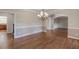 Bright dining room featuring hardwood floors and chandelier at 4348 Meadow Vista Dr, Stonecrest, GA 30038