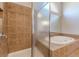 Bathroom with a shower and a built-in jetted tub at 4348 Meadow Vista Dr, Stonecrest, GA 30038