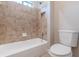 Clean bathroom with a tub and shower combination at 4348 Meadow Vista Dr, Stonecrest, GA 30038