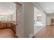 View of kitchen and living room from hallway at 4348 Meadow Vista Dr, Stonecrest, GA 30038