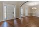 Hardwood floors and neutral-toned walls in living room at 4348 Meadow Vista Dr, Stonecrest, GA 30038