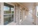 Brick back porch with French doors and windows overlooking the community at 4348 Meadow Vista Dr, Stonecrest, GA 30038