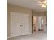 Bedroom with double closets and access to hallway at 4348 Meadow Vista Dr, Stonecrest, GA 30038