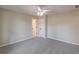 Spacious bedroom with neutral carpeting and ceiling fan at 4348 Meadow Vista Dr, Stonecrest, GA 30038