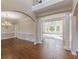 Spacious dining room with hardwood floors and elegant chandelier at 4348 Meadow Vista Dr, Stonecrest, GA 30038