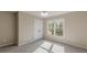 Bright bedroom with ceiling fan and window at 4348 Meadow Vista Dr, Stonecrest, GA 30038