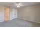 Spacious bedroom with ceiling fan and ample closet space at 4348 Meadow Vista Dr, Stonecrest, GA 30038